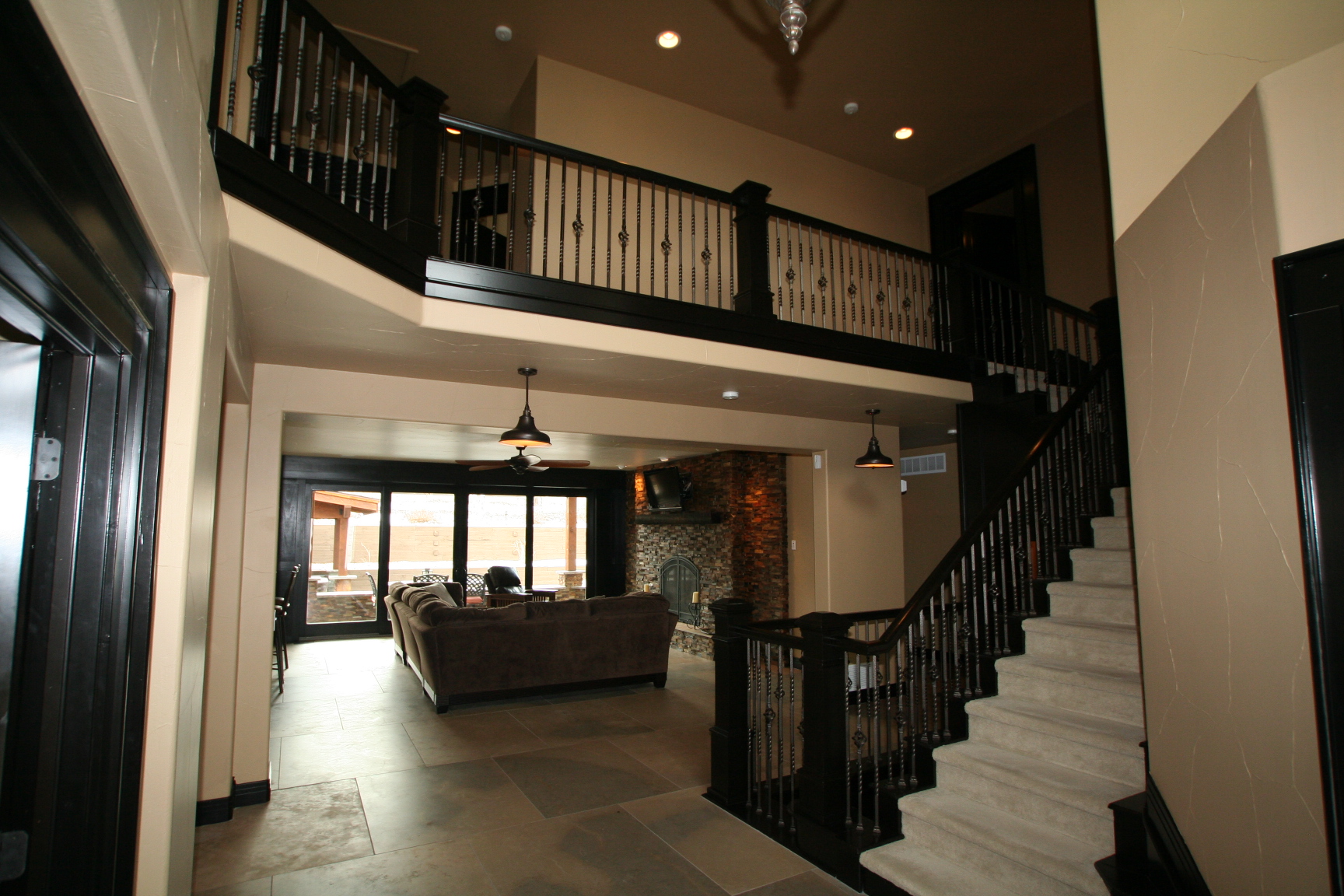 Renovated family room with stone fireplace